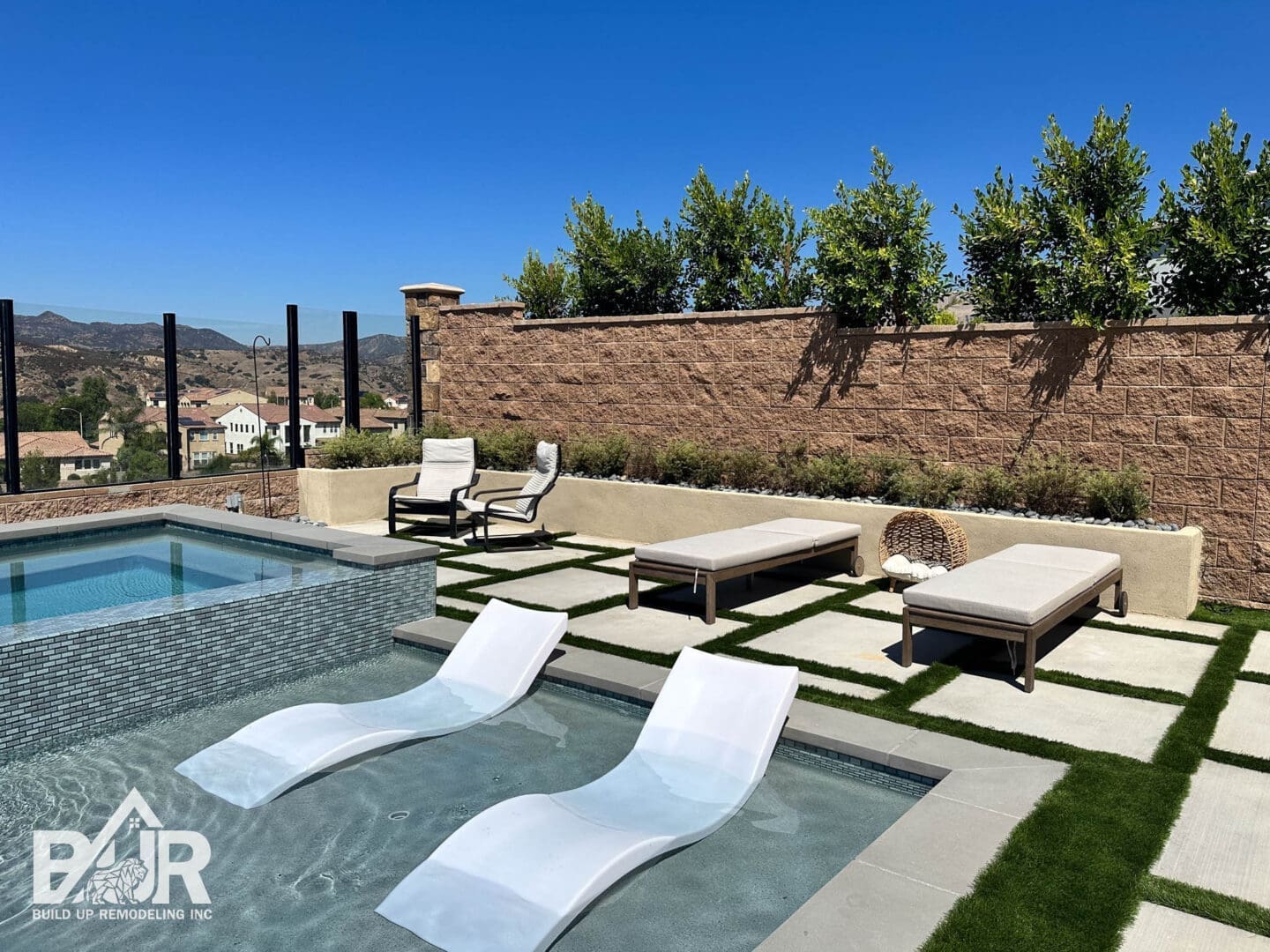 Luxury custom pool and spa integrated into a complete backyard remodel