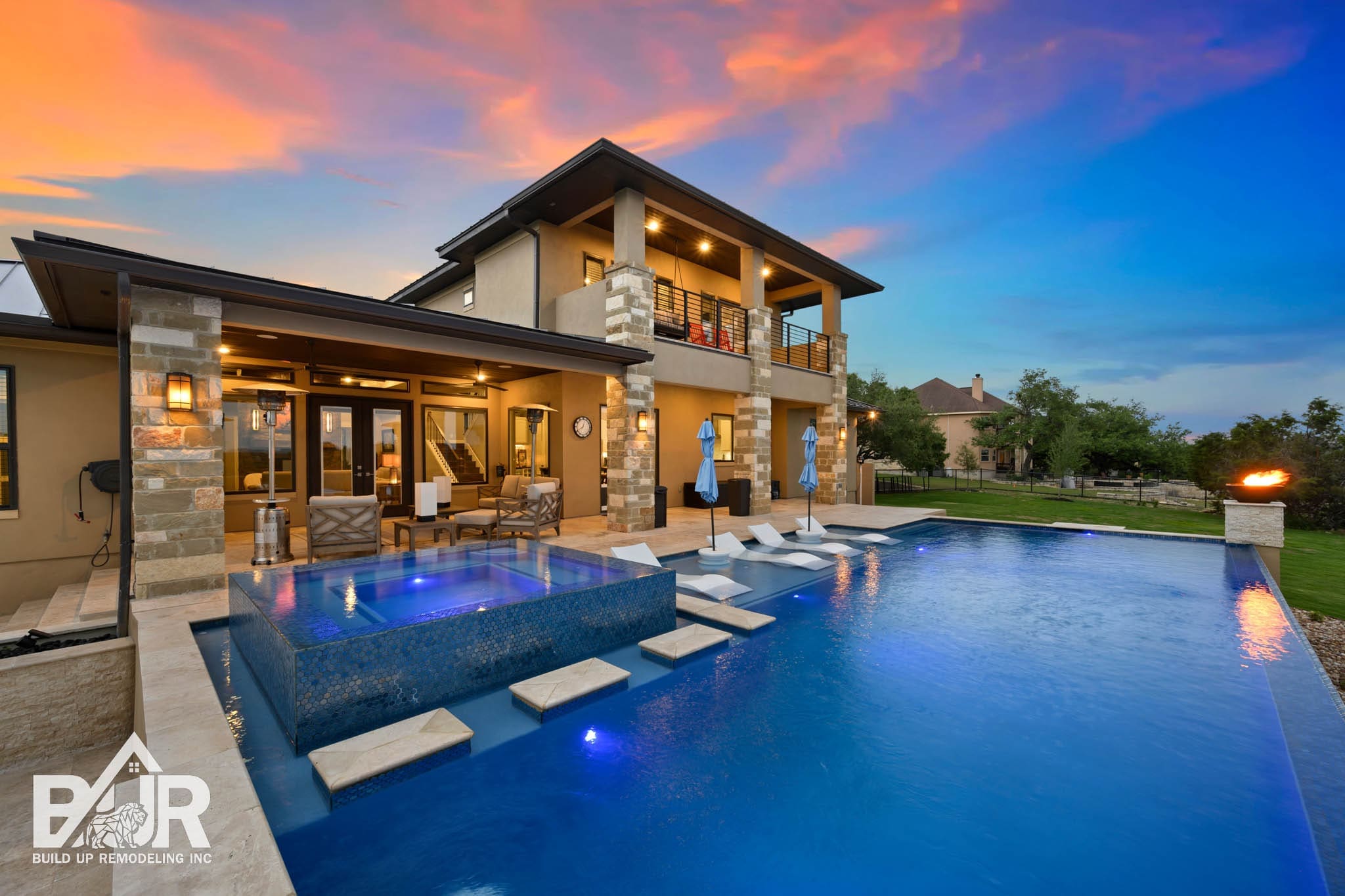 Luxury backyard remodel with pool, fire pit, and outdoor living space in Los Angeles