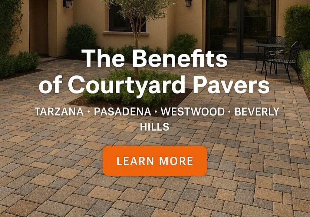 Courtyard with pavers and outdoor furniture.