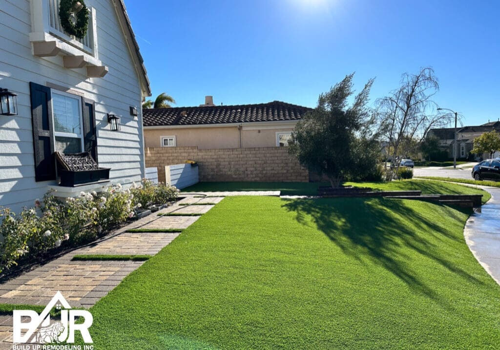 PAVERS AND TURF IN FRONT YARD DRIVEWAY